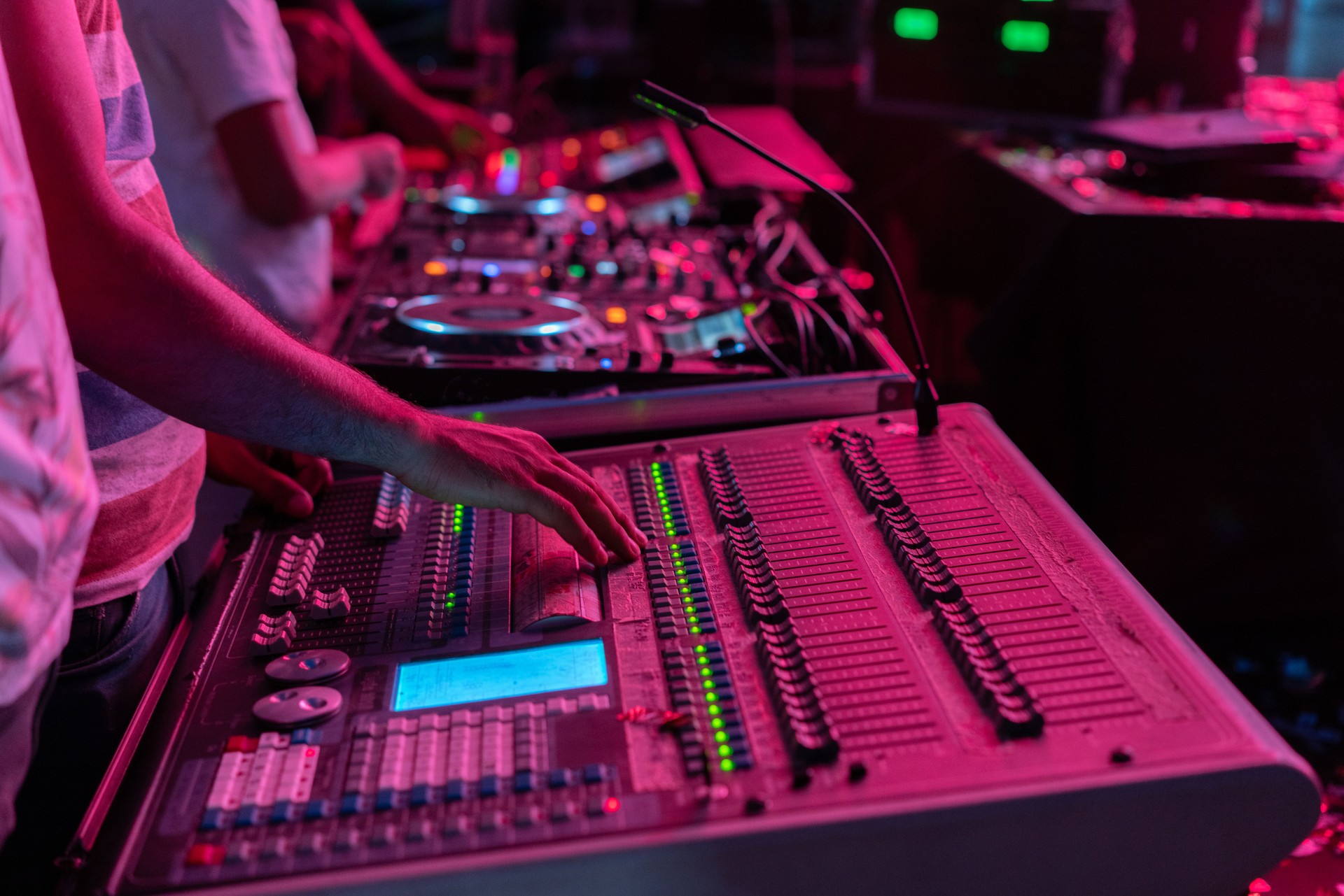 Sound engineer mixed live music concert at a stage performance